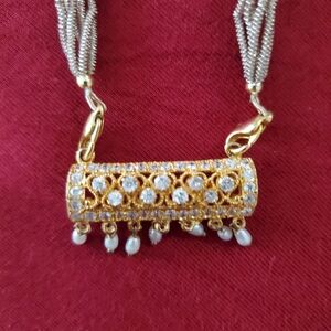 Elegant Gold and Silver Necklace with Pearl Accents